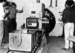 Inserting target train into target tube of Neutrino Lab.(L to R):A.J.Bianchi, J.Guerra, D.Carpenter, G.Krafczyk, J.Simon, L.Read