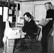 (L to R) Stewart Loken and Paul Kunz, members of Experiment 26 group, working on computer calculations